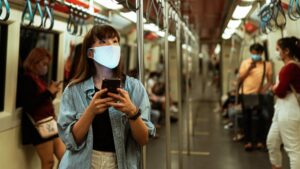 Woman in Subway on Cellphone