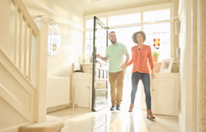 Couple walks into new home