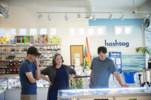 Husband and wife cannabis business owners in their shop