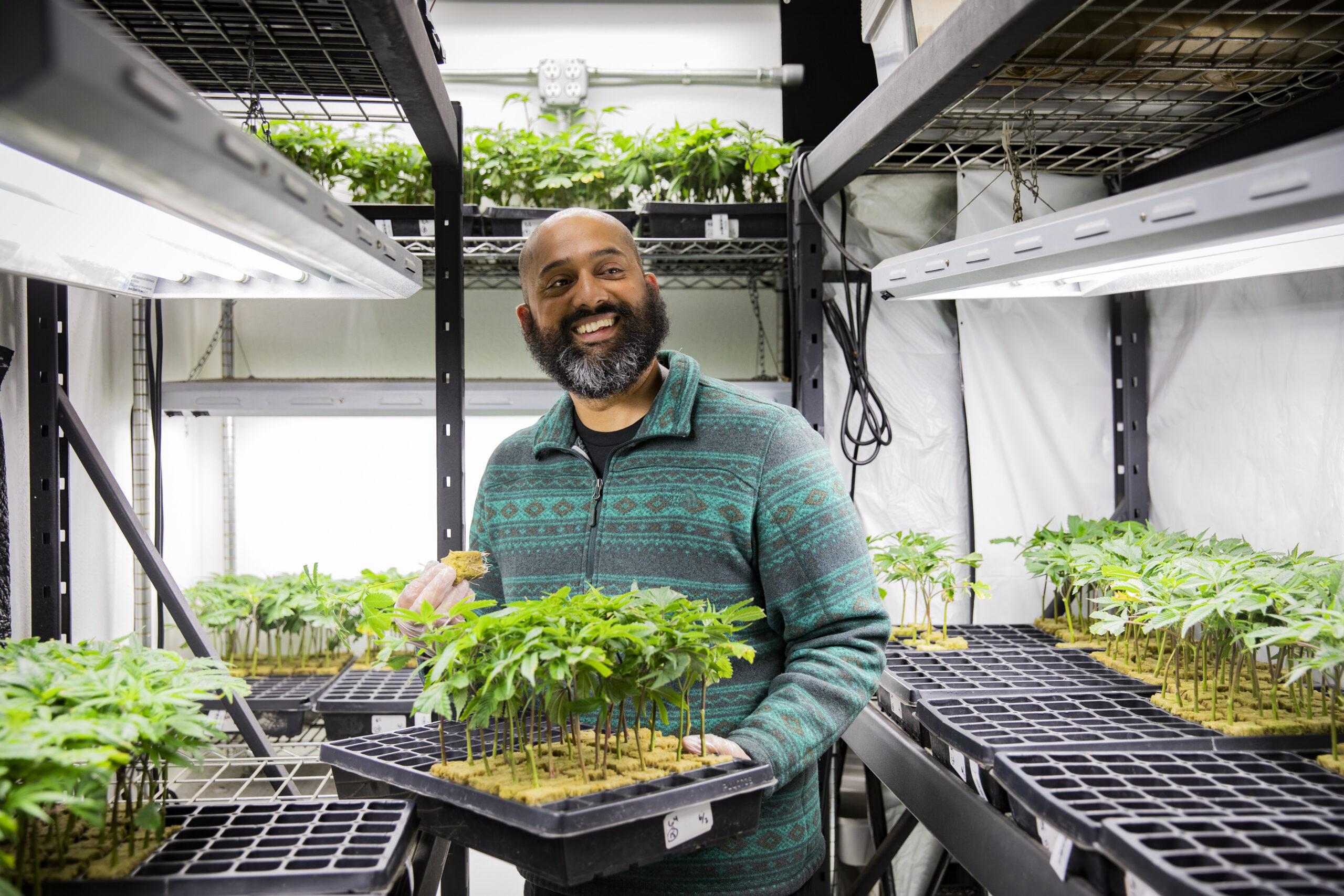 Cannabis business owner at cultivation warehouse.