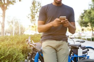 Person using digital banking in the park